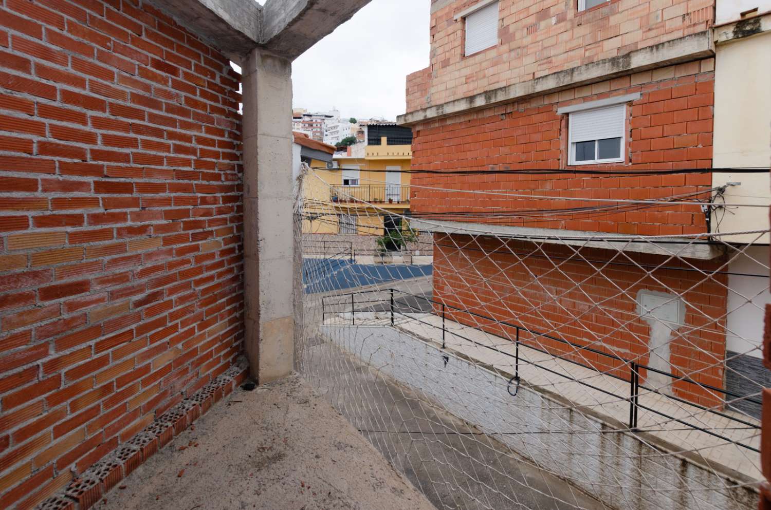 Edificio de 2 apartamentos/viviendas  y garaje, situado en  CIUDAD JARDÍN (MÁLAGA).